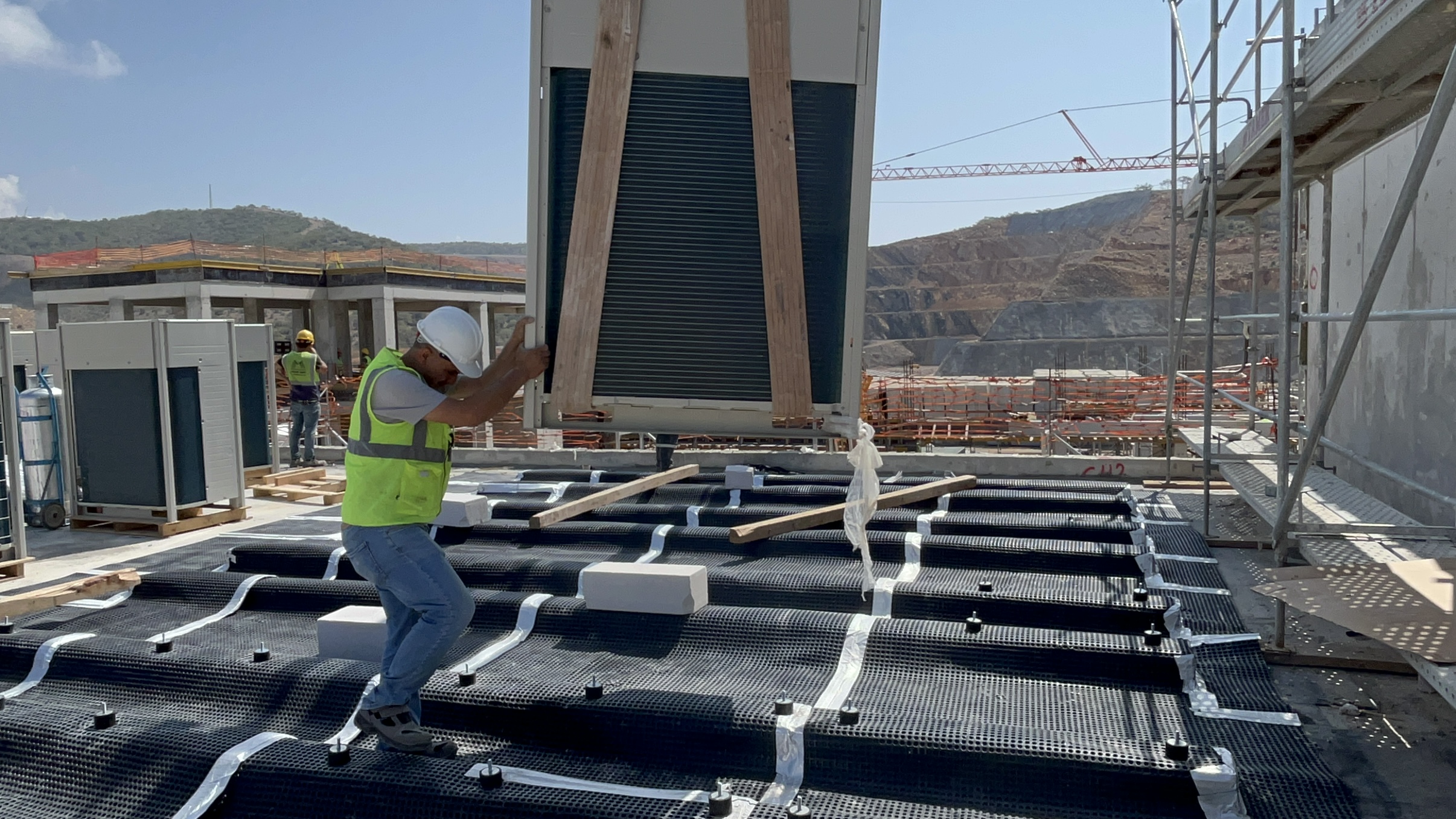 ATLAS technician working on a commercial cooling installation